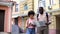 Tourists with map and photo camera, choosing direction, travelling vacation