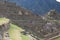 Tourists milling about a section of Machu Picchu including Nusta`s Bedroom, The Temple of the Sun and The Main Temple