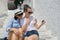 Tourists mother and daughter hugging, take selfie video recording on camera