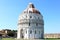 Tourists near Baptistry of St. John in Pisa, Italy