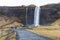 Tourists are near Seljalandfoss, Iceland