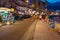 Tourists near shops in Giardini Naxos in night