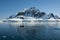 Tourists observing a glacier on the Antarctica, Paradise bay, Antartic