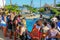 Tourists observing turtles in big tank at The Project Tamar