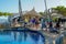 Tourists observing turtles in big tank at The Project Tamar