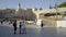 Tourists and others mingle near the Wailing Wall in Jerusalem.