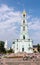 Tourists and parishioners around the bell tower. Holy Trinity-St. Sergiev Posad