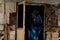 Tourists pass through the door of ruined school in Pripyt,