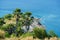 Tourists at Phromthep cape viewpoint at the south of Phuket Island, Thailand. Tropical paradise in Thailand. Phuket is a popular