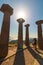 Tourists and pillars of Temple of Athena in Assos Ancient City