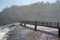 tourists on platform in waters of Iguacu river, at Iguacu falls, Brazil