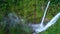 Tourists are playing zip line waterfall in Laos,Rainforest, Asia
