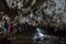 Tourists in Polovragi cave, Romania