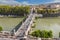 Tourists on Ponte Sant`Angelo the Aelian Bridge in Rome, view from Castel Sant`Angelo