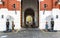 Tourists pose for a photo next to the guard of honor at the entrance to the Moscow Kremlin