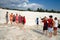 Tourists posing and taking pictures against travertines in Pamukkale