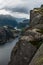 Tourists on Preikestolen cliff in Norway, Lysefjord view