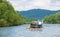 Tourists raft on the Dunajec river, south of Poland