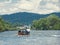 Tourists raft on the Dunajec river, south of Poland