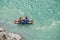 tourists-rafters rafting on mountain river