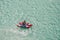 Tourists-rafters rafting on mountain river