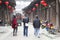 Tourists and red lampions in the ancient town Daxu, China