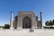 Tourists on Registan Square in front of Sherdor Madrasah in Samarkand