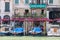 Tourists relax in the coastal outdoor cafe, Venice, Italy