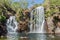 Tourists and residents enjoy refreshing swim at Florence Falls, very popular desitination for tourists and locals alike,