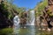 Tourists and residents enjoy refreshing swim at Florence Falls, very popular desitination for tourists and locals alike,