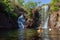 Tourists and residents enjoy refreshing swim at Florence Falls, very popular desitination for tourists and locals alike,