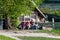 Tourists rest at a rest area near the Ventas Rumba - the widest waterfall in Europe