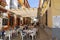 Tourists at restaurants with outdoor seating Ronda Spain