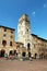 Tourists resting in San Gimignano Square