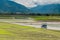 A tourists ride electric tricycles on the field roads.Landscape View Of Beautiful Rice Fields At Brown Avenue, Chishang,