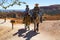 Tourists ride horses on horse trial at Bryce Canyon National Park in Utah