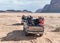 Tourists ride in open jeeps in the Wadi Rum desert Visitor near Aqaba city in Jordan