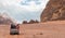 Tourists ride in open jeeps in the Wadi Rum desert Visitor near Aqaba city in Jordan