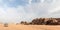 Tourists ride on a tender through vast expanse of the red desert of Wadi Rum near Amman in Jordan