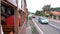 Tourists riding at famous tram moving on railroad tracks.