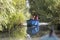 Tourists riding the motorboat on a canal