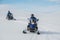 Tourists riding a snowmobile at Vatnajokull Glacier