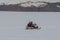 Tourists riding a snowmobile at Vatnajokull Glacier