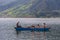 Tourists in rowboat symbol of Phewa lakeside in Pokhara.