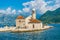 Tourists sailed on a yacht to the island of Gospa od Skrpela in the Boka Bay of Kotor.