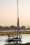 Tourists sale on felucca on Nile river on the sunset in Egypt