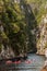 Tourists setting out in Kayaks up the Storms River gorge at Storms River Mouth, South Africa