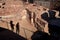 Tourists shadows between de ruins of Castle of Silves, Portugal