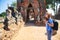 Tourists are shooting portrait. Female photographer photographed in the archaeological site. Selfie portrait. Travel and tourism.