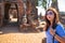Tourists are shooting portrait. Female photographer photographed in the archaeological site. Selfie portrait. Travel and tourism.